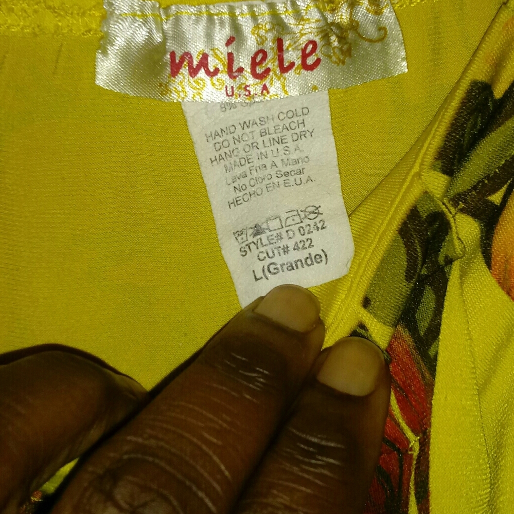 A knee length, large print flowered dress.